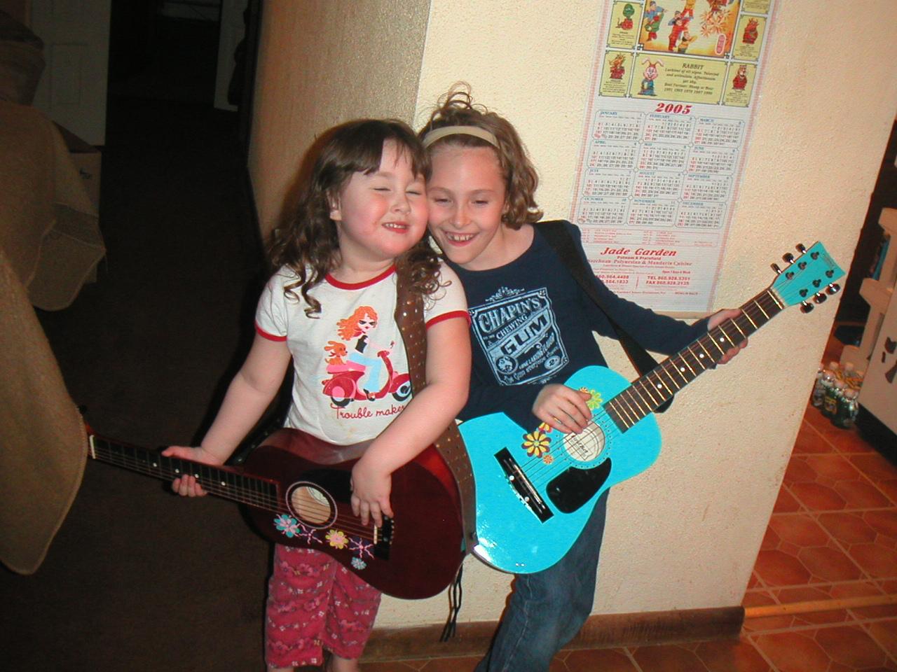 Abi and my little sister Nic with their guitars!