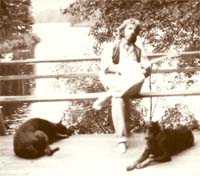 Dusty with his Dobermans